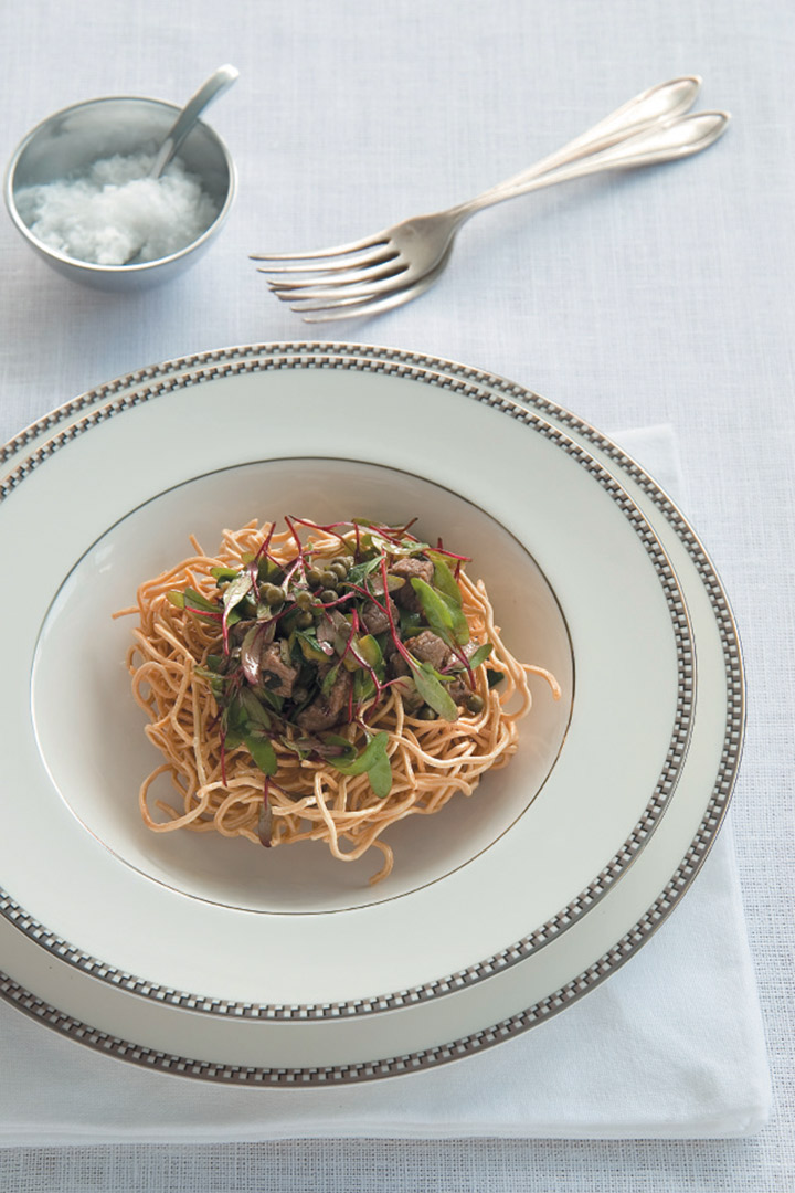 Aromatic fillet and baby marrow served on a bed of deep-fried noodles recipe