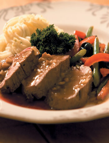 Fillet of beef with porcini mushroom gravy, mashed potatoes and stir-fried vegetables recipe