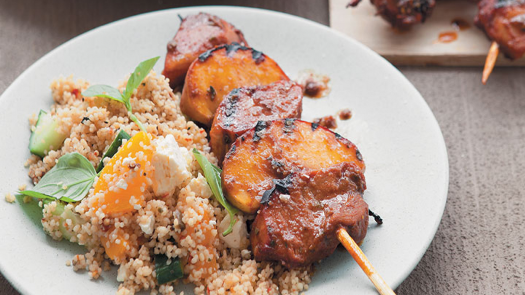Pork and peach kebabs with peach and cucumber couscous salad
