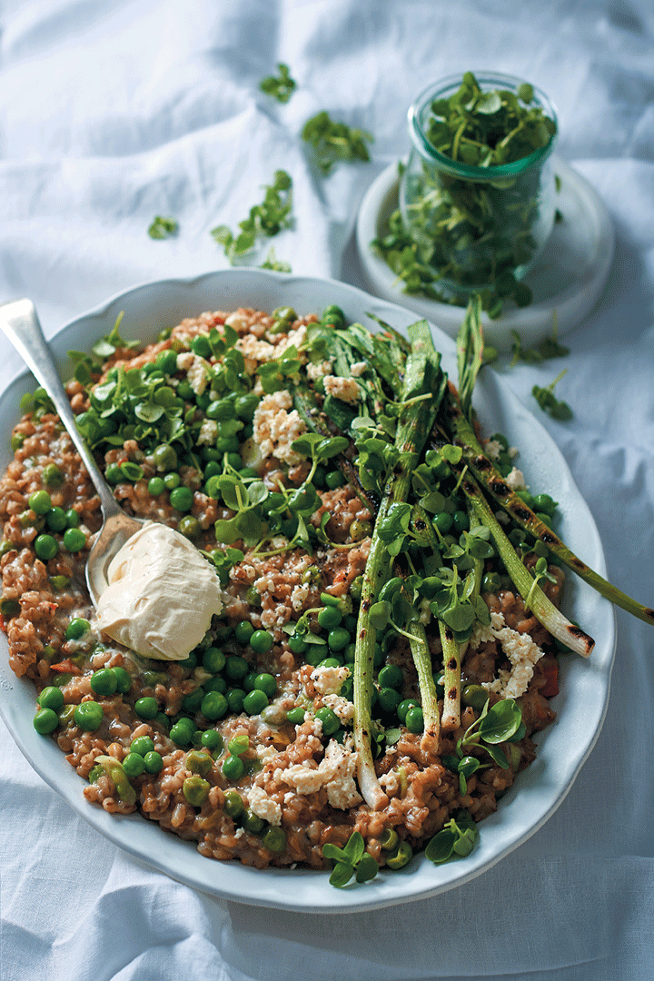 Barley and coconut-milk risotto with peas, baby leeks and feta recipe