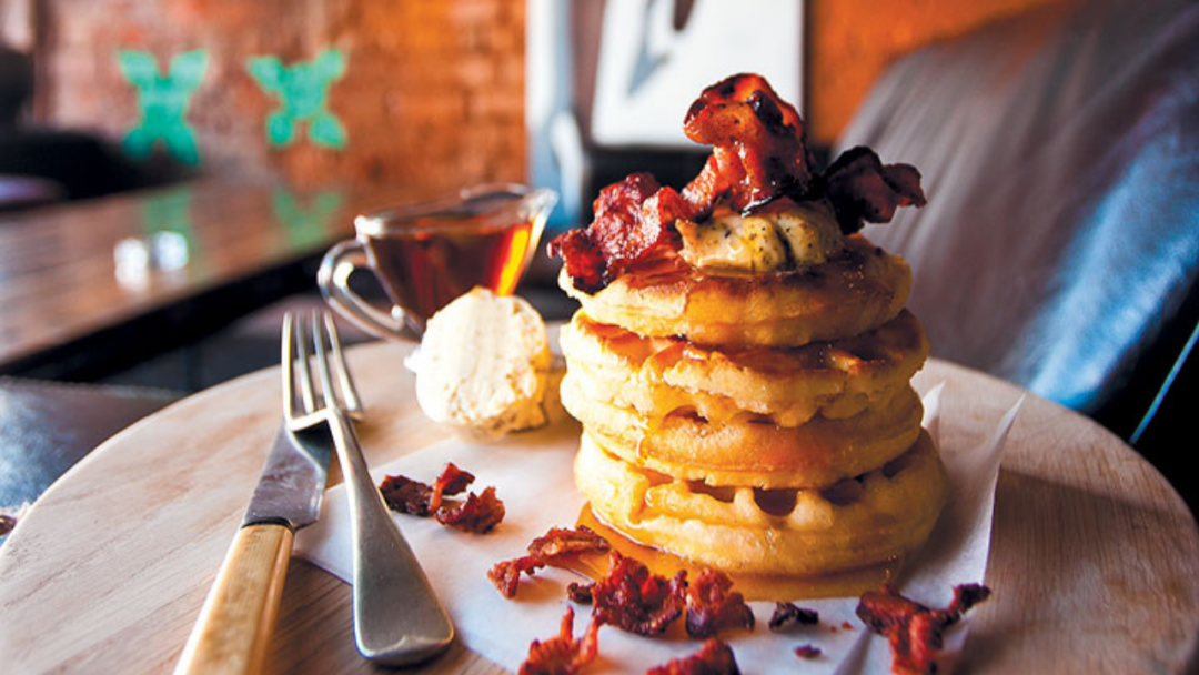 Buttermilk waffles with crispy bacon and spiced maple syrup