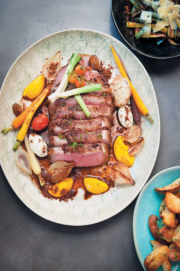 Roast beef with carrot, horseradish, duck fat potatoes and baby marrows recipe