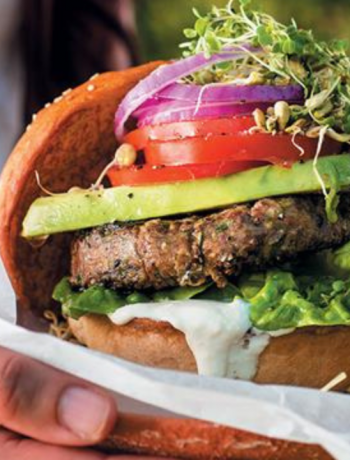 White bean and baby marrow burgers with cashew mayo and a sprout salad