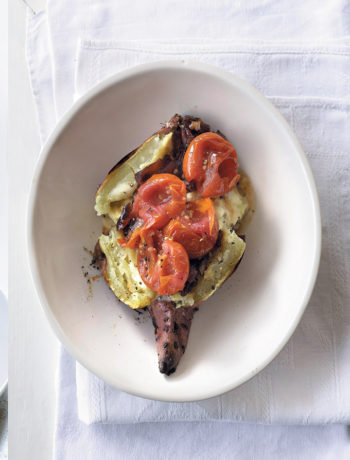 Baked sweet potato with caramelised red onion, Rosa tomatoes and creme fraiche recipe