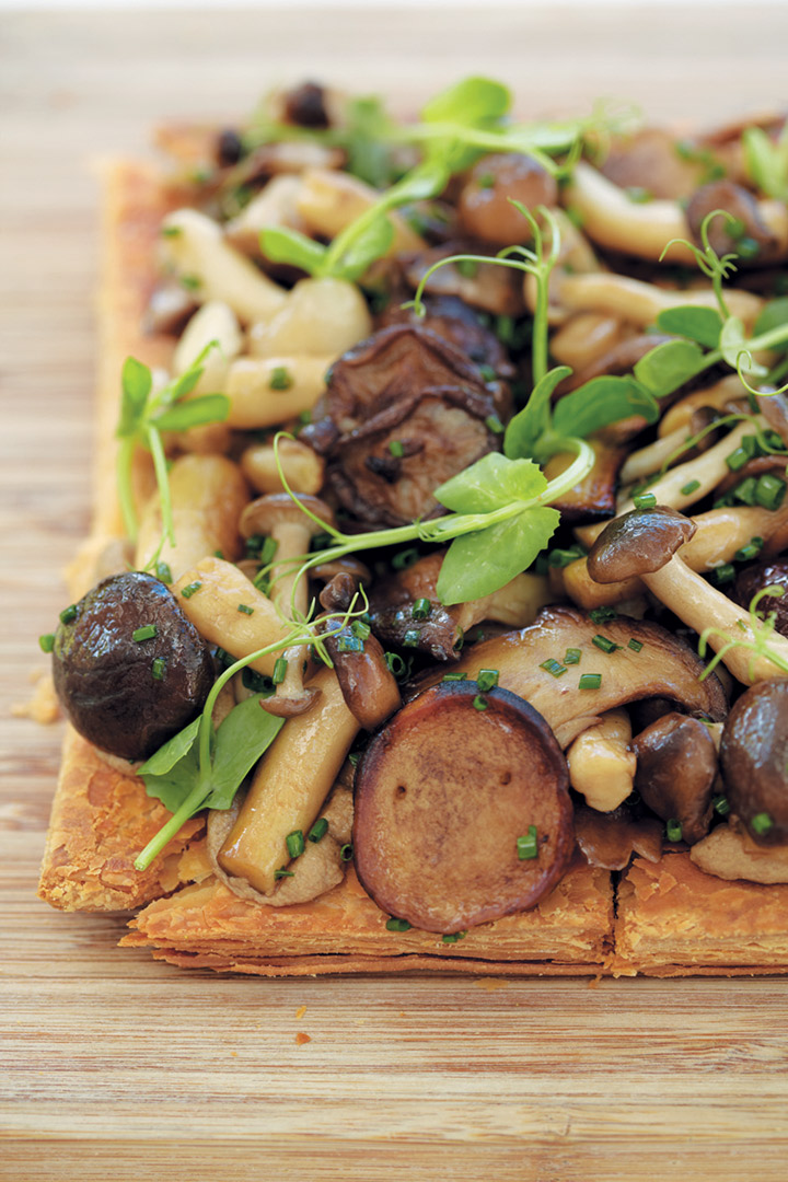 Wild mushroom tart with porcini vinaigrette and pea shoots recipe