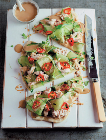Crispy flatbread with shredded chicken and quick-pickled cucumber