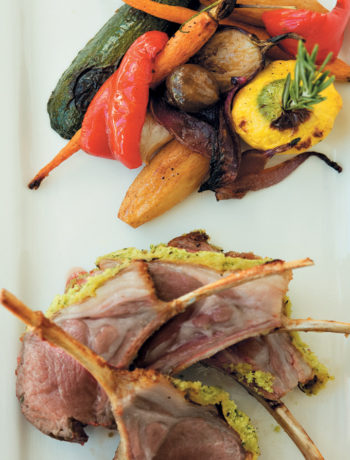 Roast rack of lamb with a rosemary and mustard crust served with slow-roasted farm-style vegetables recipe