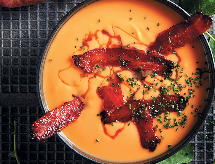 Sweet potato soup with maple and whisky-glazed bacon