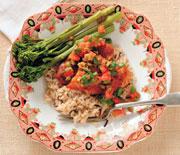 Grilled chicken breast with wild rice, broccoli and tomato-olive salsa