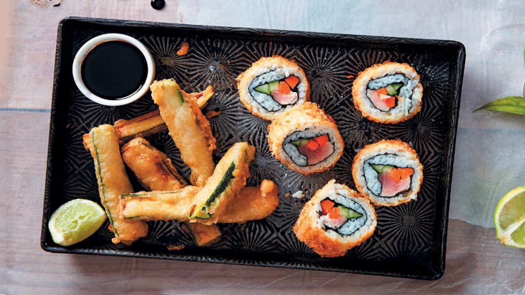 Deep-fried tuna rolls and tempura baby marrow chips