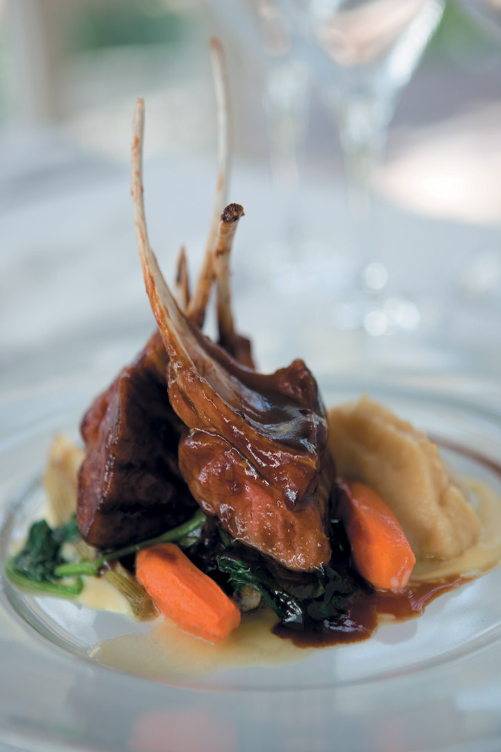 Liquorice lamb with roasted carrots, vanilla parsnip mash, wilted spinach, potato cream and carrot jus recipe