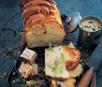 Savoury croque-monsieur bread-and-butter pudding with a Cheddar sauce recipe