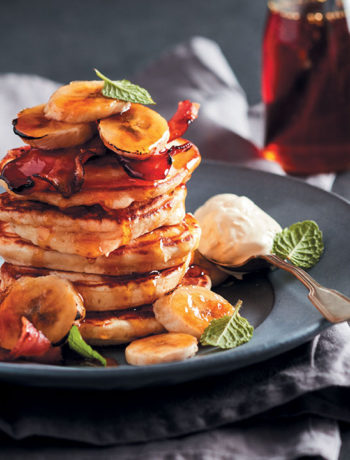 Fried banana, bacon and ricotta flapjack stack
