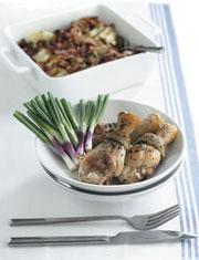 Pan-fried chicken with roast potatoes and bacon