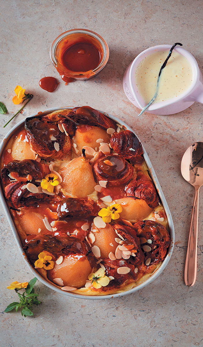 Caramel-glazed poached pear bread and butter pudding recipe