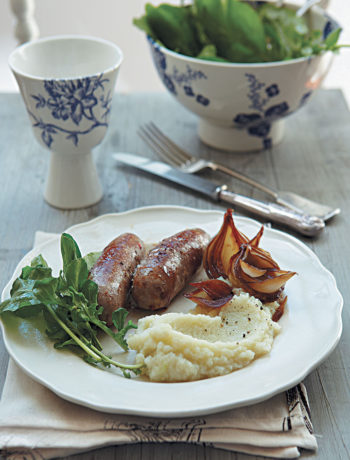 Cauliflower and garlic purée with lamb sausages and balsamic roasted onions recipe