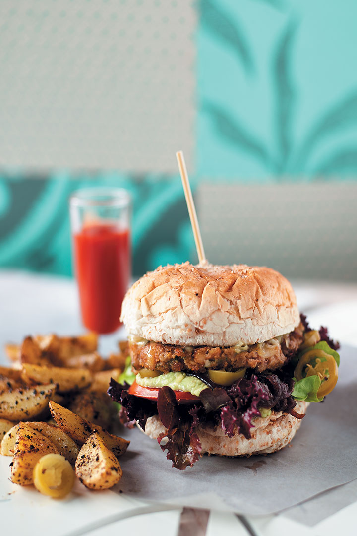 Mexican twist burger with Cheddar, jalapenos, caramelised onions and guacamole recipe