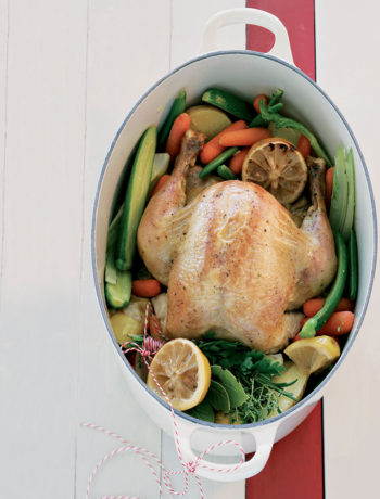 Organic pot roast chicken with lemons and vegetables recipe