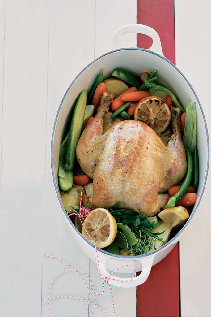 Organic pot roast chicken with lemons and vegetables recipe