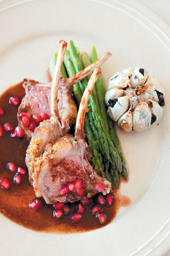 Rack of lamb with Parmesan and nut crust served with a saffron and orange jus recipe