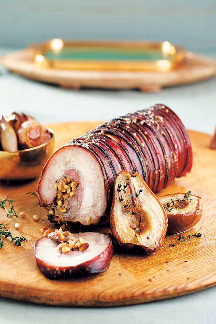 Roasted porchetta with pear and pine nut stuffing recipe