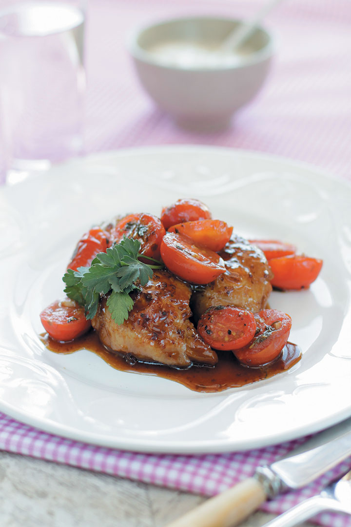 Sticky chicken thighs with warm marinated Rosa tomatoes and chunky tzatziki recipe