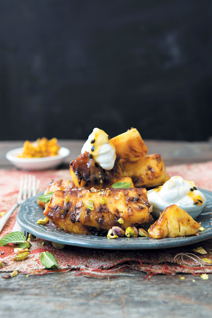 Sweet and spicy chargrilled pineapple with coconut-granadilla cream and pistachios recipe