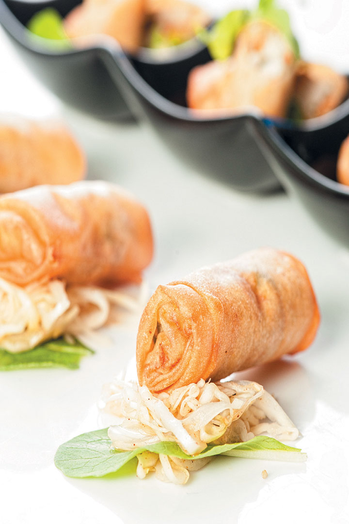 Thai chicken spring rolls on spicy pickled cabbage salad recipe