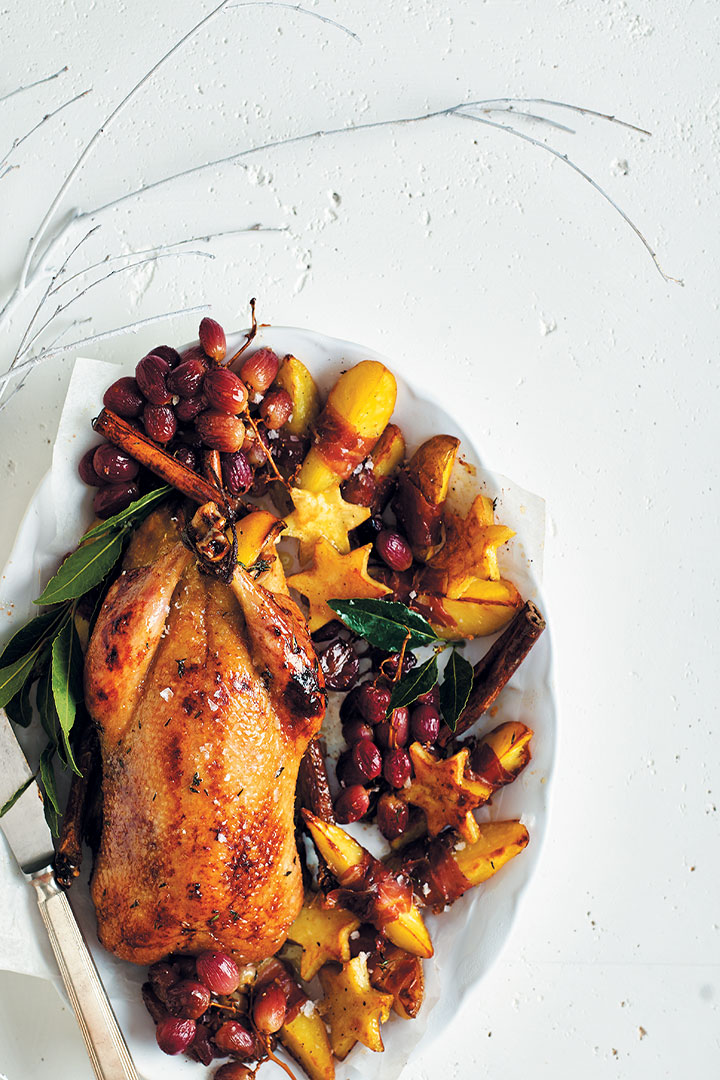 Honey-glazed duck with grapes and potato wedges recipe