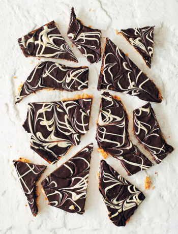 The secret ingredient is always chocolate! This recipe for marbled double chocolate matzo bark is the ultimate indulgence. Why don't you whip some up right now?