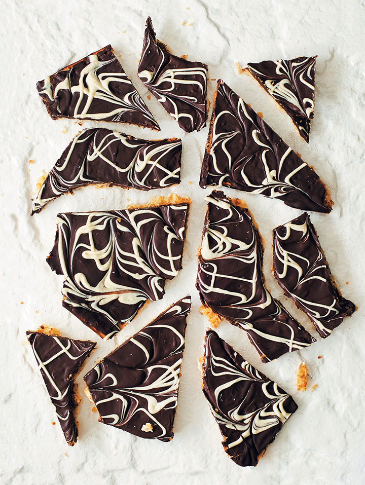 The secret ingredient is always chocolate! This recipe for marbled double chocolate matzo bark is the ultimate indulgence. Why don't you whip some up right now?