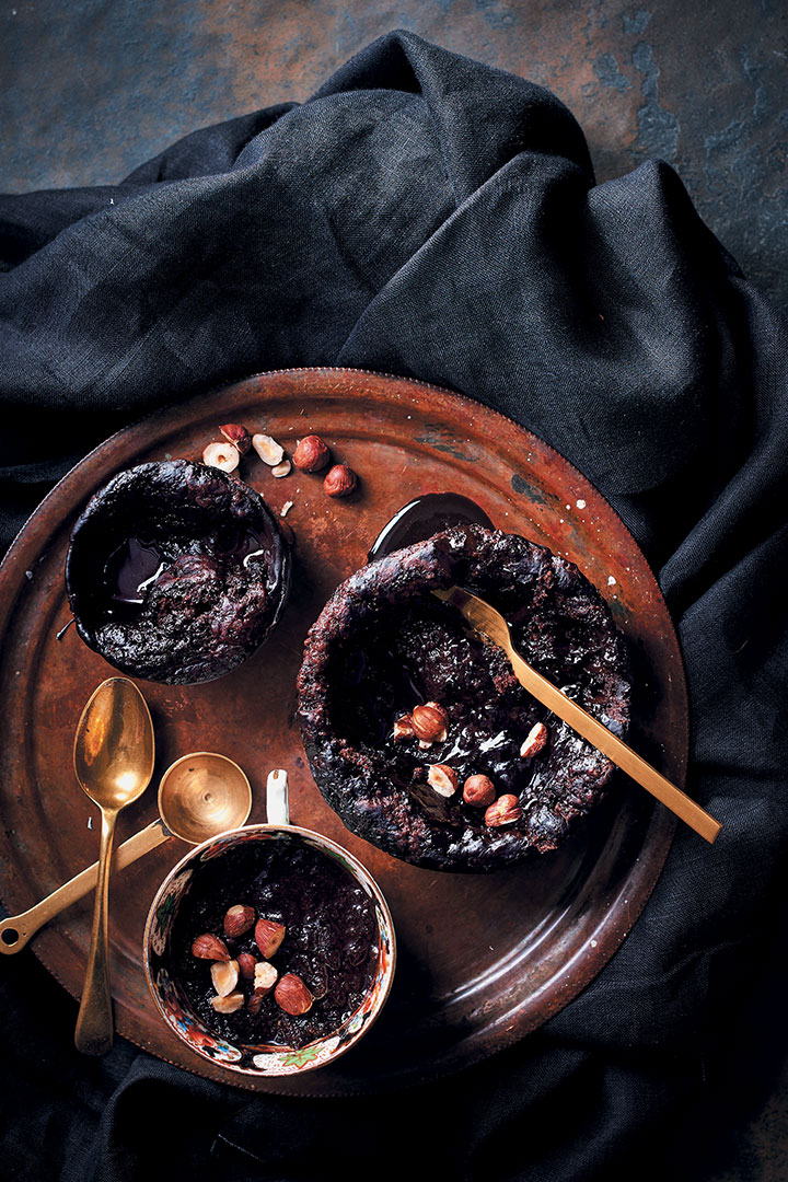 Molten self-saucing choc puddings with hazelnuts recipe
