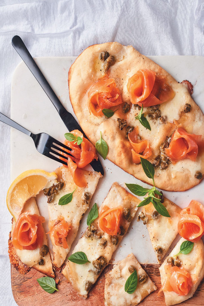 Naan pizzas with buffalo mozzarella, smoked trout and capers recipe