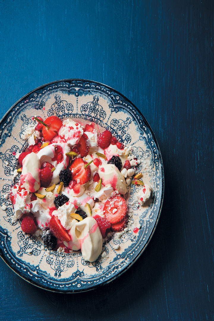 Crushed meringue with berries, whipped cream, rose-elderflower syrup and pistachio recipe
