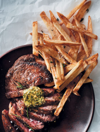 Pan-fried rib eye steak with herbed butter and skinny potato chips recipe