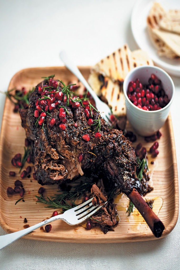 Slow-roasted Easter leg of lamb with pomegranate and rosemary recipe