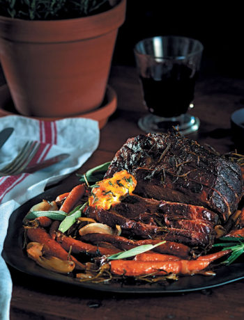 Roasted beef with relish-and-herb butter and sweet roasted baby carrots