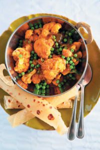 Cauliflower and potato curry with peas