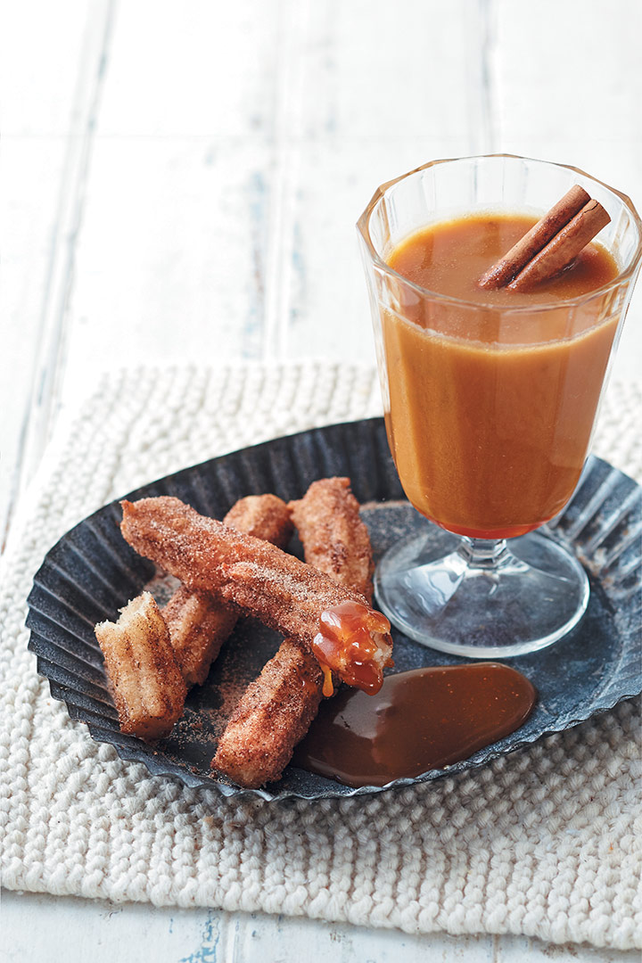 Hot butterscotch and cider shake with churros