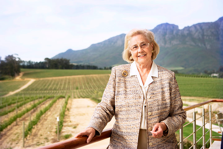 May De Lencquesaing, grande dame of Glenelly Estate in Stellenbosch The Lady May, Glenelly’s flagship estate wine named in honour of Glenelly’s Grande Dame, May-Eliane de Lencquesaing, is an exceptionally graceful and stylish Cabernet Sauvignon with a dash of other Bordeaux varieties. It is naturally fermented and matured in new French oak for 24 months. Elegant and complex, the wine develops flavours of cassis, blackcurrant, dark cherry, raspberries and delicate spicy plum. The wine displays an exquisite structure, seamless oak, velvety tannins and a silky savoury finish and has a very good aging capability of 12 to 18 years. A sculpture of Madame de Lencquesaing by Maxime Real del Sarte (1948), a wedding gift, is depicted on the Lady May wine label. This highly acclaimed Cabernet has received many prestigious awards, including a pinnacle 5-star rating for the 2009 vintage in Platter’s wine guide. The 2011 Lady May received a 92 point rating in Wine Advocate, 93 points in Wine Enthusiast and 95 points in Tim Atkin’s South African Report. Lady May 2012, with brand new packaging, will be released towards the end of 2017 The name and concept of the estate’s flagship Cabernet remain the same. However, the new packaging makes for a stronger identity, incorporating gold foiling on a dark brown background with the handwriting of May de Lencquesaing. The capsule is gold tin and embossed.