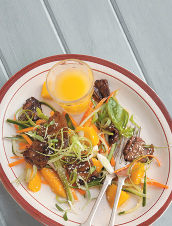 Sweet and sticky Thai stir-fried pork belly and mango salad