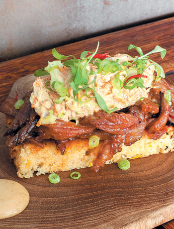 Pulled beef brisket on cornbread and Asian-style miso slaw