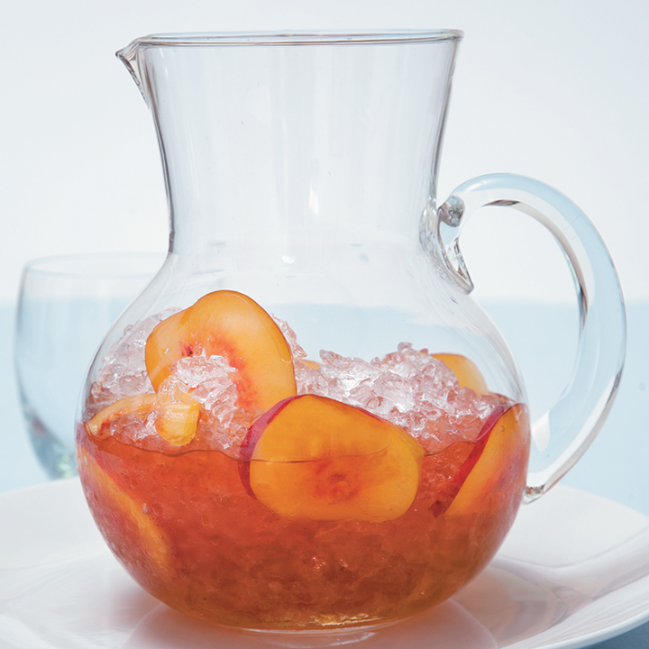 Jug of iced muscadel with slices of peach and nectarine