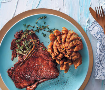 Sweet and sticky T-bone steak with blooming onions