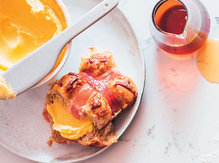 Savoury hot cross buns with mature cheddar, thyme and sticky maple bacon