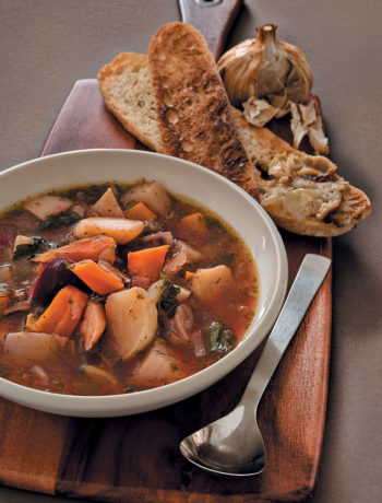Baby root-vegetable soup with baked garlic toast