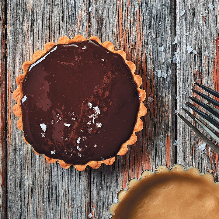 Salted caramel, chocolate and peanut-butter tartlets