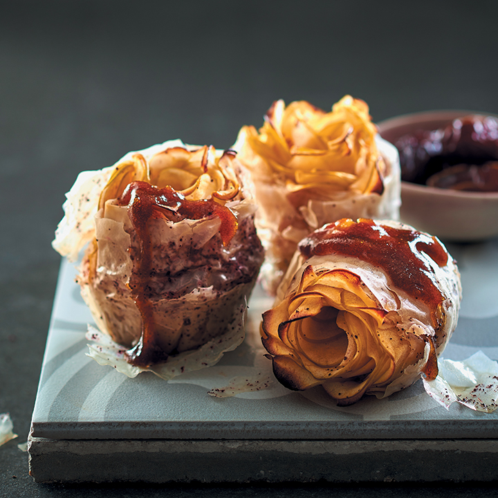 Apple and sumac filo roses with date caramel sauce