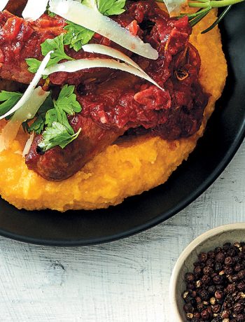 Beef sausages in red wine sauce with polenta