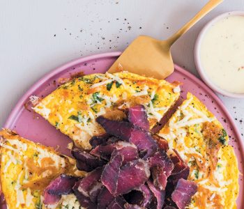 Caramelised onion, biltong and coriander frittata with mature Cheddar sauce